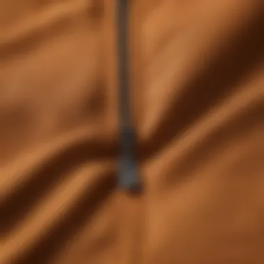 Close-up view of fabric texture of Carhartt Midweight Zip