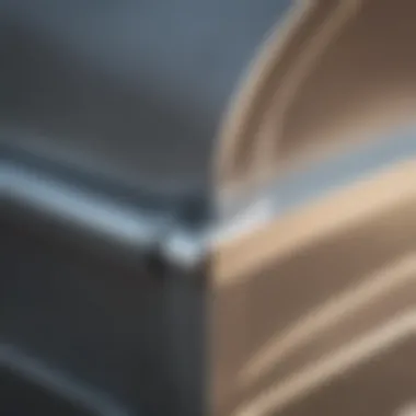 Close-up of chrome U channel trim installation on structure