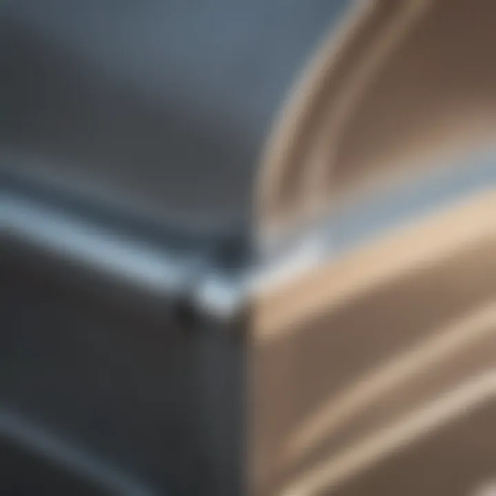 Close-up of chrome U channel trim installation on structure