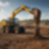 Post hole digger attached to a front end loader in action