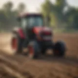 Small tractor seeder in a field