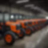 A variety of Kubota tractors lined up in a Michigan dealership