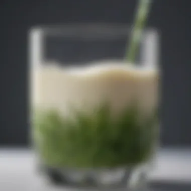 A close-up of a glass of grass-finished milk showcasing its creamy texture and rich color.