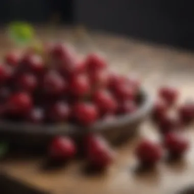 Close-up view of fresh cherries on a wooden table