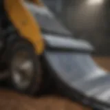 Detailed view of a pull behind scraper blade showcasing its engineering and design features.
