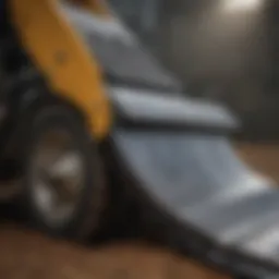 Detailed view of a pull behind scraper blade showcasing its engineering and design features.