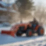 Garden tractor maneuvering snow in a winter landscape