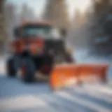 Stand-on snow plow in action clearing snow from a driveway